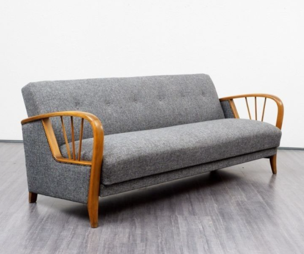 Gray sofa with wooden arms