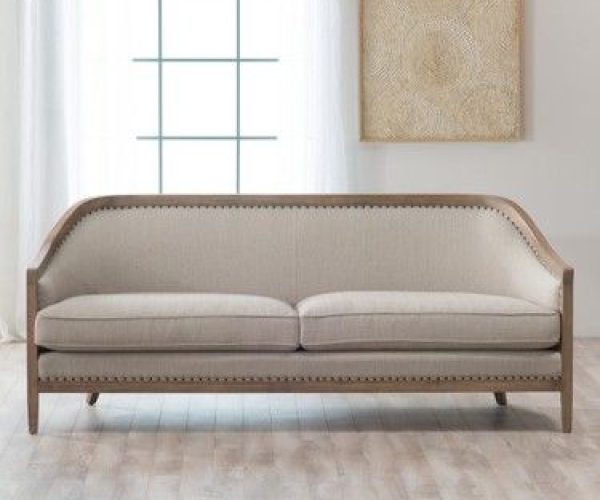 Elegant light-colored sofa with wooden frame